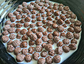 Chocolate corn flakes with milk closeup. Quick healthy breakfast