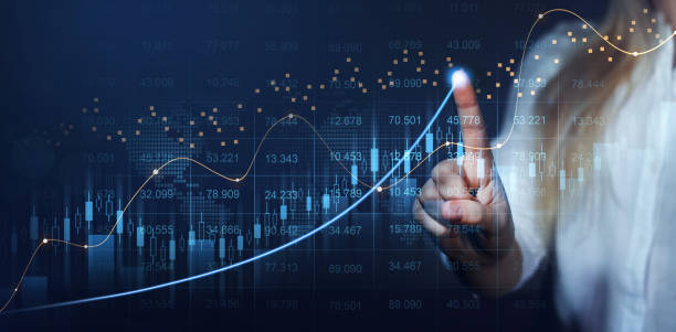 Trader analyzing data on virtual screen.Price graph and indicator. Stock market invest and crypto currency. Stock market and business investment. Trader analyzing data on virtual screen.Price graph and indicator. Stock market invest and crypto currency. Stock market and business investment organization improvement risk finance stock pictures, royalty-free photos & images