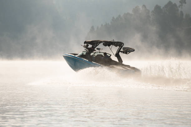istock rear view of modern bright blue motorboat quickly floating on the water 1404416632