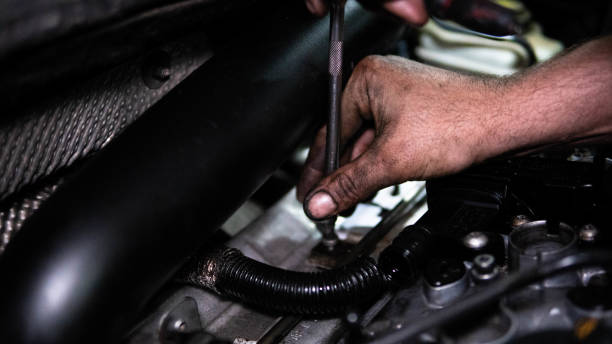 istock Working on Car Engine in Mechanics Garage stock photo 1404417689