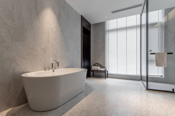 istock Simple, bright and spacious bathroom bathtub 1404420419