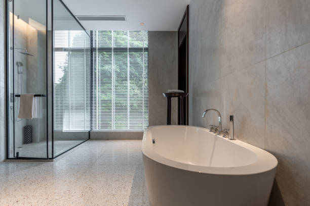 istock Simple, bright and spacious bathroom bathtub 1404420569