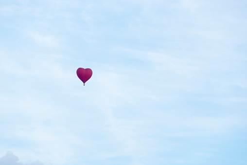Balloons flying low overhead