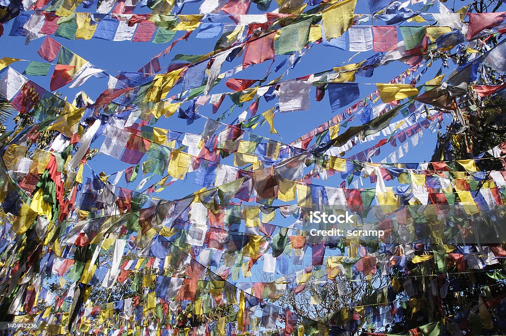 Multi-colored prayer flags fill the sky Colorful prayer flags in Darjeeling, India. Darjeeling - India Stock Photo