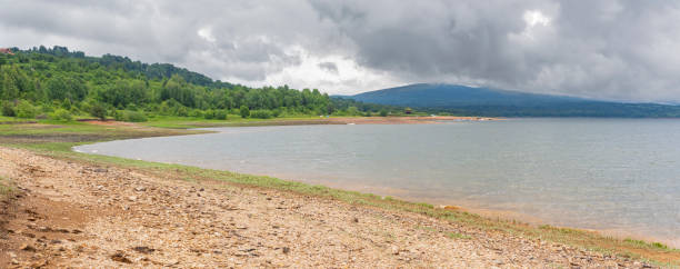istock Panoramic view of Vlasina lake on cloudy day. 1404425294