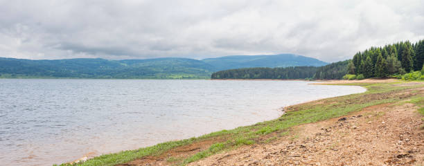 istock Panoramic view of Vlasina lake on cloudy day. 1404425872