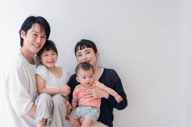 istock Family with babies in a group photo 1404428936