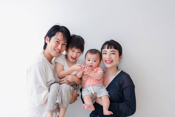 istock Family with babies in a group photo 1404428939