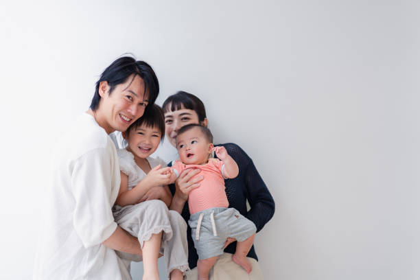 istock Family with babies in a group photo 1404428966