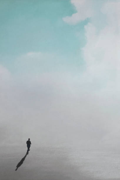 lonely man walks towards the horizon of a surreal sky vector art illustration