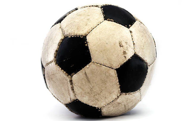 muddy football a used football placed over white old football stock pictures, royalty-free photos & images