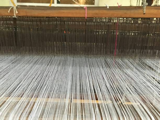 istock wooden loom making textiles 1404431526