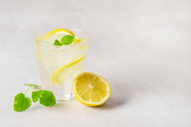 istock Fresh Summer Drink Cold Lemonade with Mint on a Concrete Background Healthy Drink Detox Copy Space 1404433162