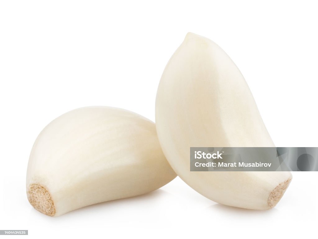 Garlic cloves on white Garlic cloves, isolated on white background Garlic Clove Stock Photo