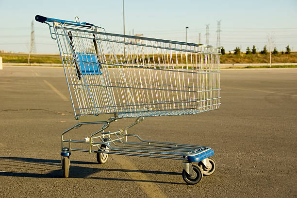 istock Shopping Cart sitting alone in a parking lot 140443485