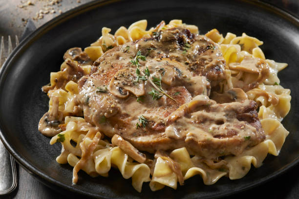 istock Braised Pork Chops in Creamy Mushroom Sauce 1404435535