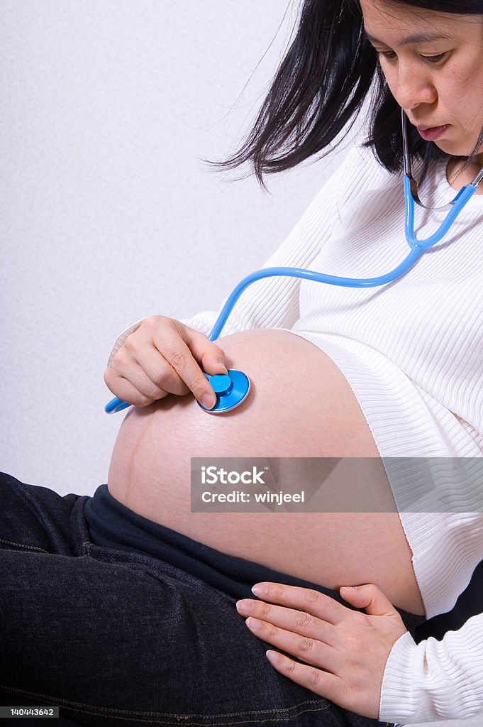 Listening One of a series of pregnant mother pictures Animal Reproductive Organ Stock Photo