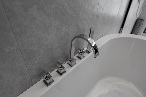 Faucet in bathroom of luxury hotel