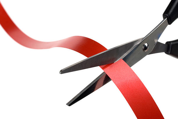 Cutting the Red Ribbon. stock photo