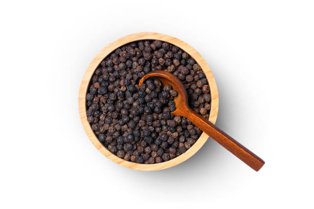 istock Black pepper seeds or peppercorns 1404442444