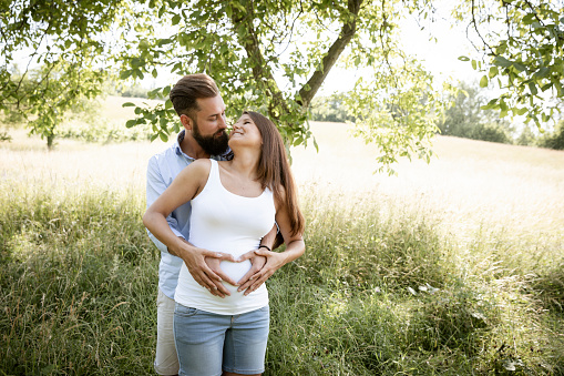 Couple drinking wine in a vineyard