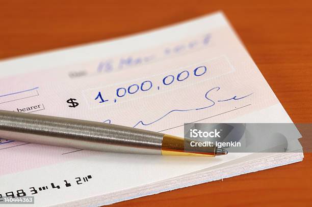 One Million Dollars Cheque And A Pen Stock Photo - Download Image Now - Agreement, Balance, Banking