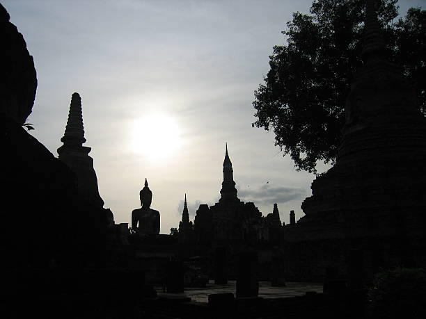 Sunset above the Buddha, Sukhothai, Thailande stock photo