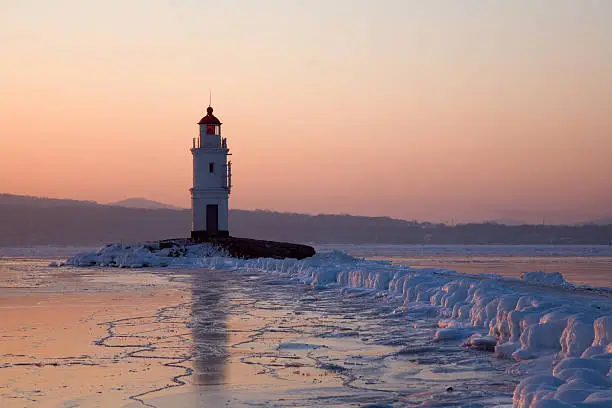 Tokarev lighthouse at East Bosfor strait early in the morning in winter, Vladivostok