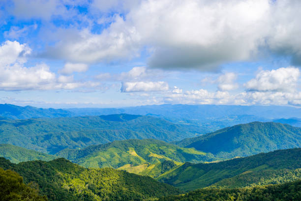 istock Beautiful mountain with meadow and forest as it is layer with the light shade at noon 1404454648