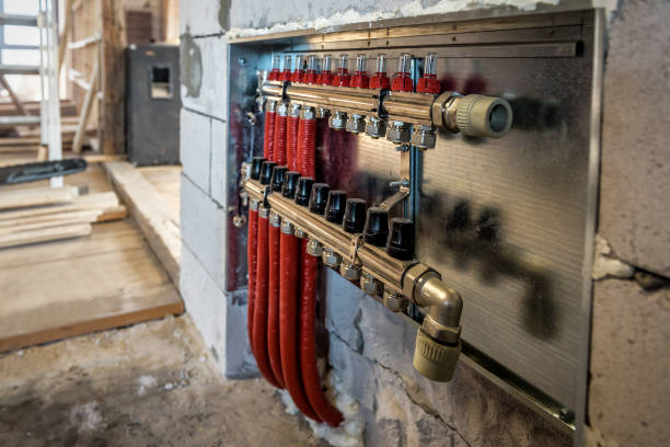 istock Collector, manifold, heating system for underfloor heating on the construction site 1404455224