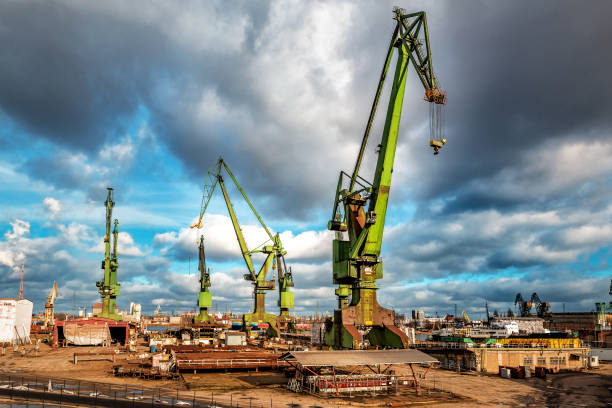 istock Huge port cranes in industrial marine zone 1404456142