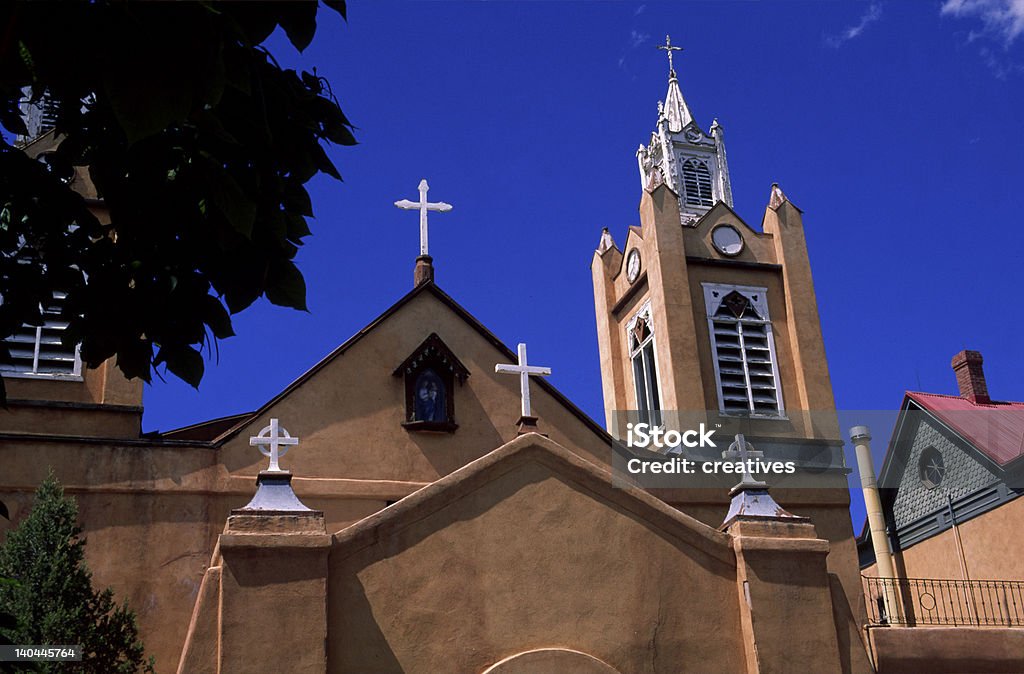 Church in Santa Fe, New Mexico Church in Santa Fe, New Mexico with brilliant blue sky Blue Stock Photo