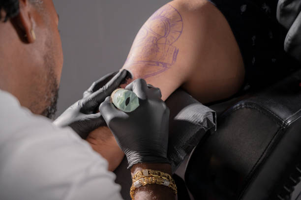 Body art at the tattoo studio. High quality photography Body art at the tattoo studio. High quality photography. arm tattoo ideas for men pictures stock pictures, royalty-free photos & images