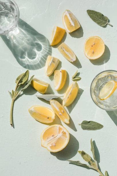 istock Summer composition made from lemon slice on white  background. Flat lay, top view 1404465188