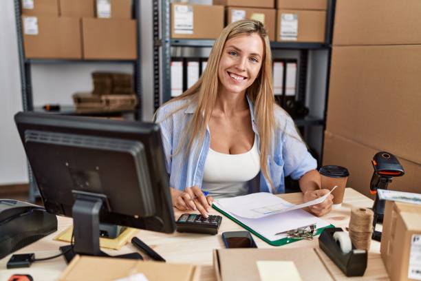 istock Young blonde woman ecommerce business worker working at office 1404465245