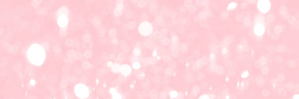 istock Pink sparkling glitter bokeh background banner 1404468244