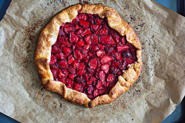 istock French dessert Galette with shortbread and strawberries. Open pie with berries. 1404468837