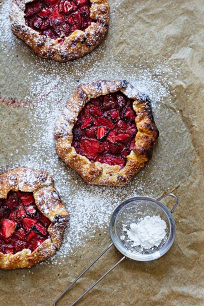 istock French dessert Galette with shortbread and strawberries. Open pie with berries. 1404468839