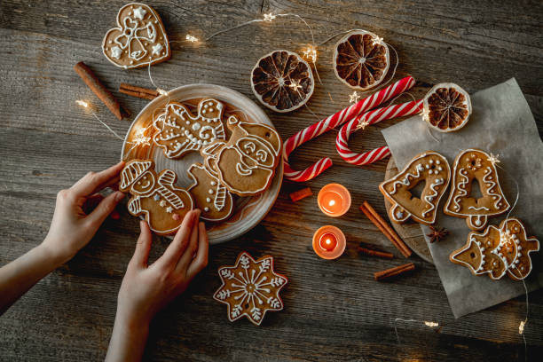 istock Hands preparing traditional christmas gingerbread 1404469226
