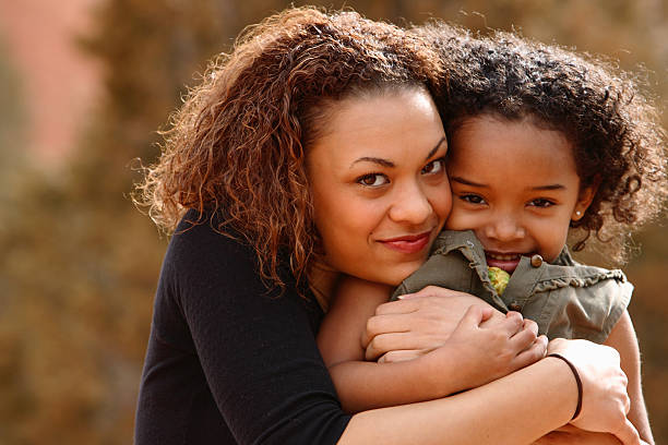 istock Mother hugging child on the mountains 140447292