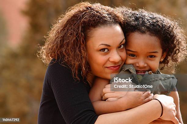 Mother Hugging Child On The Mountains Stock Photo - Download Image Now - Colorado, Parent, Daughter
