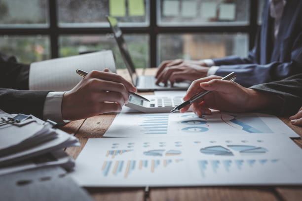 istock Businesswoman working at office with documents on his desk, doing planning analyzing the financial report, business plan investment, finance analysis concept 1404479132