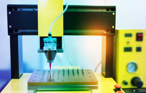 istock High precision and technology of nozzle device and needle of automatic glue dispenser machine (glue injection) 1404479765