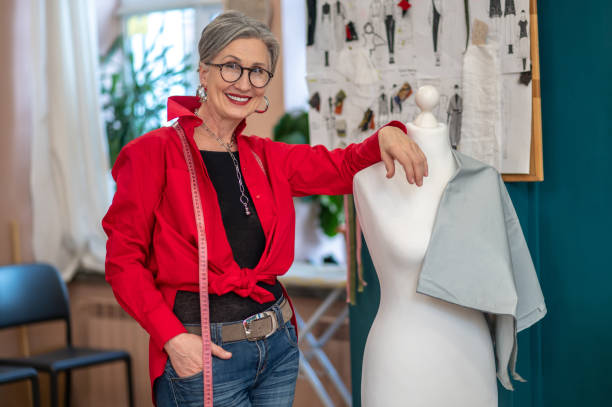 istock Confident woman touching dummy looking at camera 1404481951