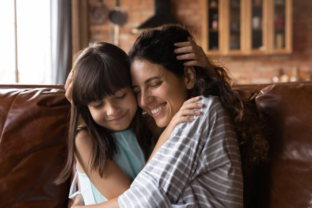 istock Happy Hispanic mother enjoying time with beloved daught 1404482797