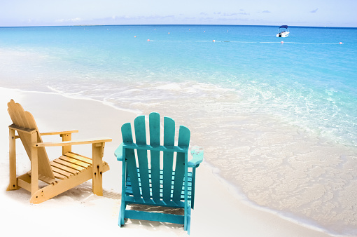 blue sun lounge in front of the caribean sea at cayo santa maria beach, cuba