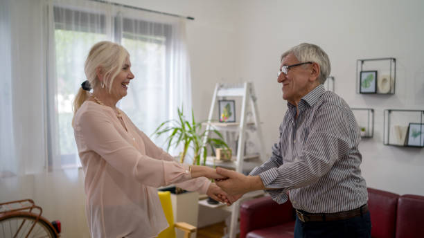 istock Happy senior couple dancing at home 1404483496