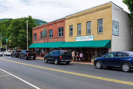 Boone, NC, USA-20 June 2022: Mast General Store on Main Street, people on sidewalk.