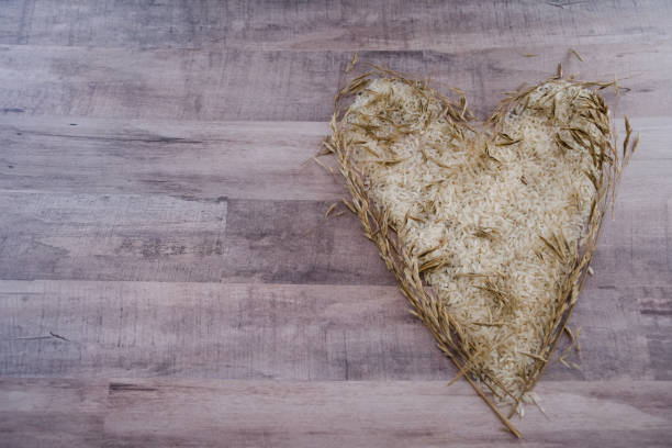 Rice and grain in heart shape stock photo