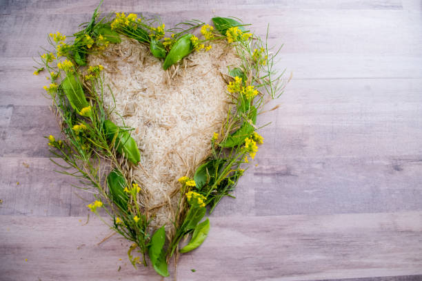 istock Rice and grain in heart shape with flowers 1404485018